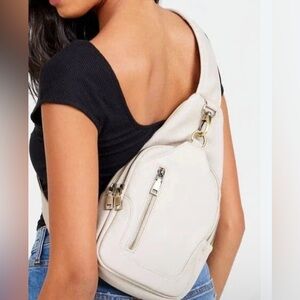 Sling Backpack Cream Faux Leather Compartments Adjustable Strap Zippers Medium